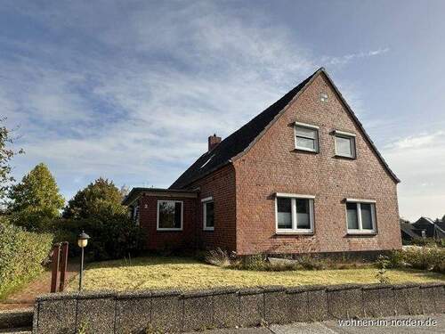 Straßenansicht - Mehrfamilienhaus, Wohnhaus mit 200,00 m² in Molfsee zum Kaufen