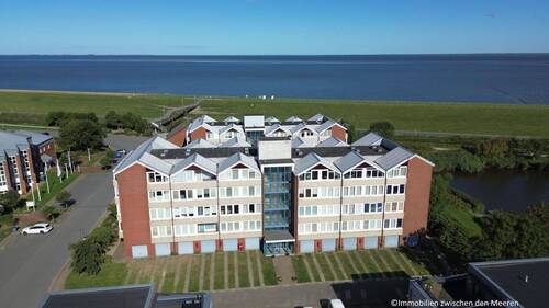 Außenansicht/Luftaufnahme - NUR 150?m bis zur Nordsee - Helle, freundliche Eigentumswohnung mit Garage
