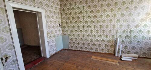 Raum I EG - 1 Zimmer Mehrfamilienhaus, Wohnhaus in Schöningen