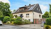 Außenansicht 1 - Einfamilienhaus mit Einliegerwohnung, großem Grundstück und vielseitigen Nutzungsmöglichkeiten