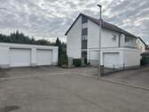 Garagen und Stellplätze - 9 Zimmer Mehrfamilienhaus, Wohnhaus zum Kaufen in Ehningen