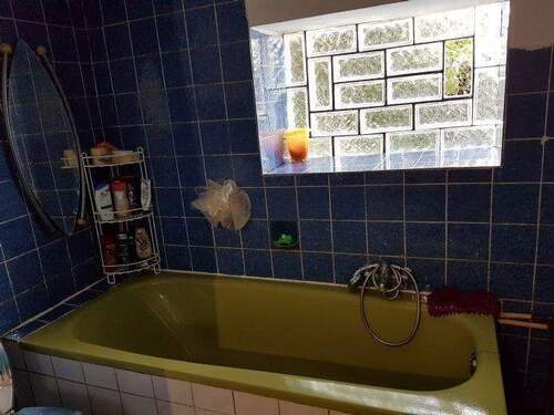 Badezimmer mit Wannenbad - 