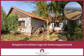 Ärzte & Apotheker Immobilien - Bungalow in schöner Lage mit Sanierungspotenzial