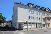 Seitenansicht - 2 Zimmer Mehrfamilienhaus, Wohnhaus zum Kaufen in Troisdorf