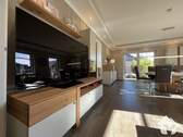 Wohnzimmer - Bungalow mit 101,10 m&sup2; in Dohren zum Kaufen