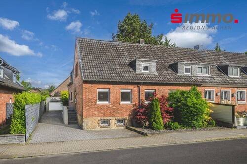 Titelbild - Charmantes Einfamilienhaus mit sonnigem Grundstück und Garage in sehr beliebter und ruhiger Lage