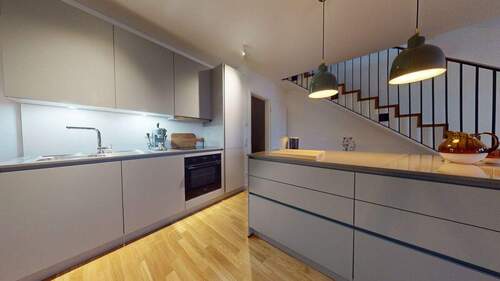 Küche mit Einbauküche - 