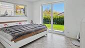 Schlafzimmer mit Zugang zur Terrasse - 