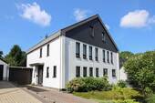 Vorderansicht - Großzügiges Familiendomizil mit Traumgarten, Ausbaureserve und bester Anbindung an Düsseldorf