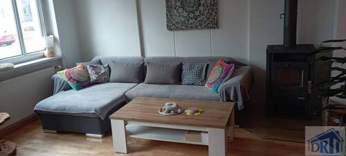 Wohnzimmer - Gemütliche Eigentumswohnung mit Kaminofen