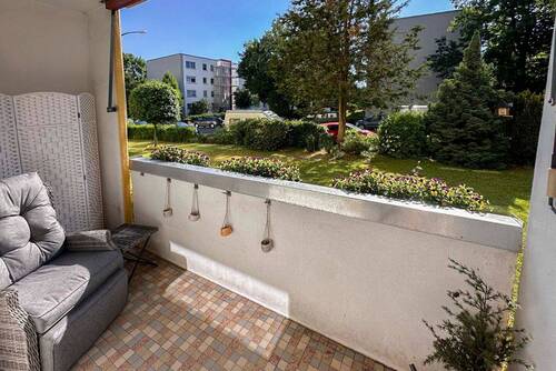 Titelbild - Gepflegte 3,5-Zimmer Hochparterrewohnung - Balkon, Gemeinschaftsgarten & Stellplatz inklusive