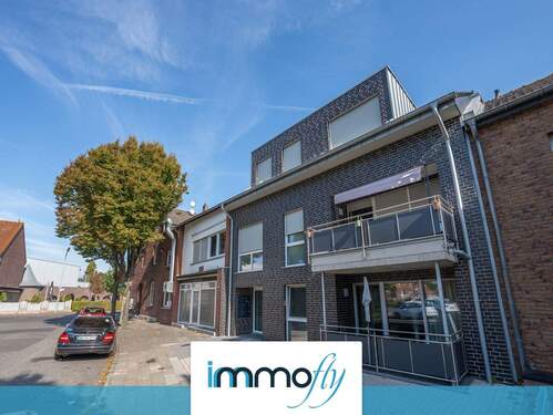 Hausansicht - Moderne Erdgeschosswohnung mit Balkon, Fußbodenheizung & durchdachtem Wohnkonzept auf 56m²