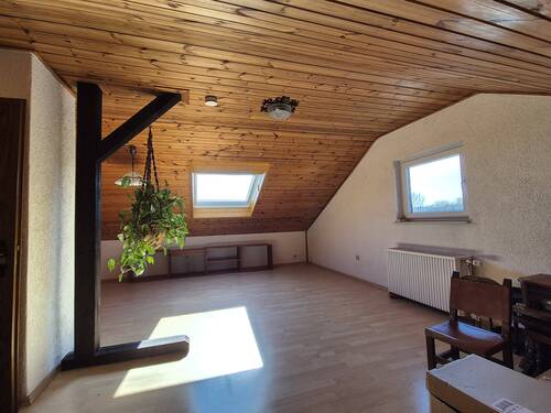 Zimmer im Dachgeschoss - 