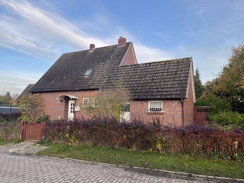 Seitenansicht - Einfamilienhaus mit 96,60 m² in Schortens / Roffhausen zum Kaufen