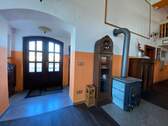Eingangsbereich und Kamin - 