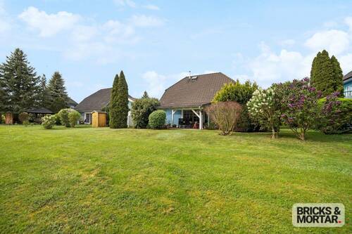 Südseite mit Garten - Wohnen mit skandinavischem Flair - modernes Holzhaus für Paare oder Familien