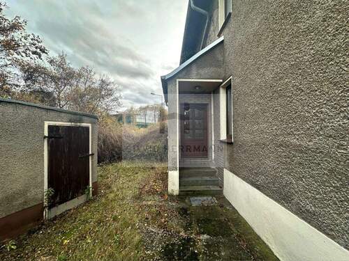 Außenansicht Eingang - Einfamilienhaus mit 139,00 m² in Ottendorf-Okrilla zum Kaufen