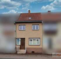 Reihenhaus mit Ausbaupotenzial und pflegeleichtem Grundstück in beliebter Lage von Merseburg.