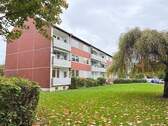 Hausansicht - Erdgeschosswohnung mit Südbalkon
