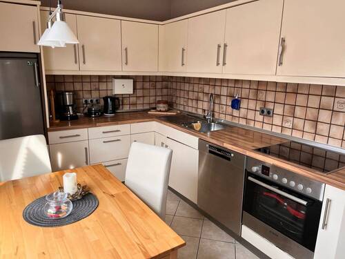 Küche mit Einbauküche - 