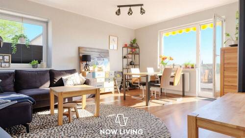 Wohnzimmer - Großzügig geschnittene 3-Zimmer-Wohnung mit Balkon und modernem Wohnkomfort