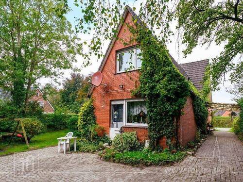 Aussenansicht Rückseite - 9 Zimmer Einfamilienhaus zum Kaufen in Moormerland