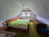 Schlafzimmer im Dachgeschoss - 