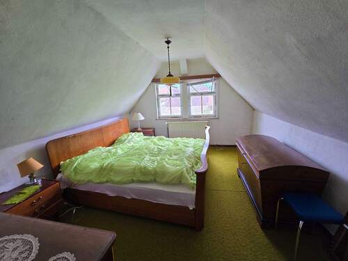 Schlafzimmer im Dachgeschoss - 