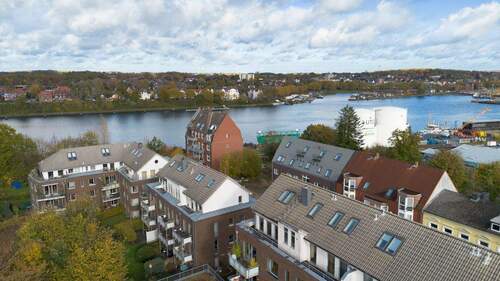 Nähe zum NOK - Vermietete Eigentumswohnung mit Terrasse und 6 Garagenstellplätzen