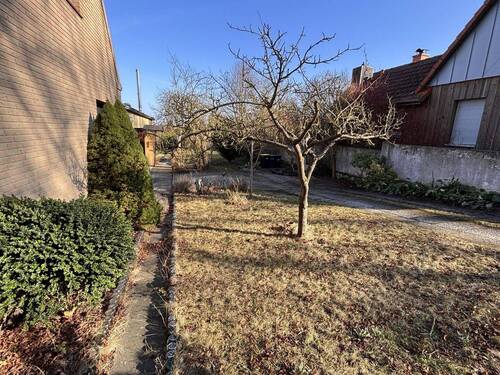 Zufahrt/Garten - Einfamilienhaus mit 140,00 m&sup2; in Heiligenhafen zum Kaufen