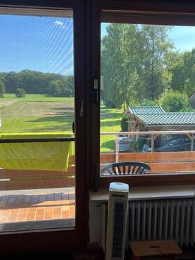 Schlafzimmer EG mit Blick und Zugang zum Balkon 2 - 