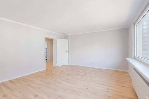 Wohnzimmer Ansicht 1 - 2 Zimmer Etagenwohnung in Mülheim an der Ruhr