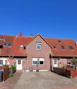 photo vorn - Gemütliches Reihenmittelhaus vor den Toren der Hansestadt Stralsund zu verkaufen
