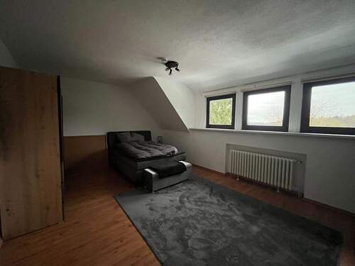 Schlafzimmer Wohnung Oben - 