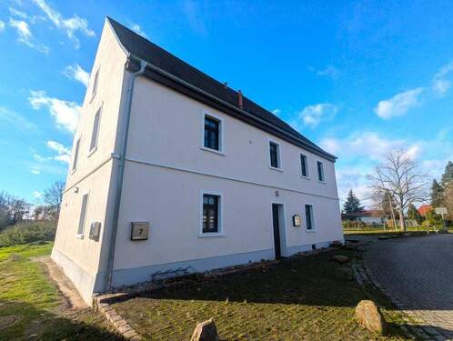 Außenansicht - Mehrfamilienhaus, Wohnhaus in Jesewitz zum Kaufen