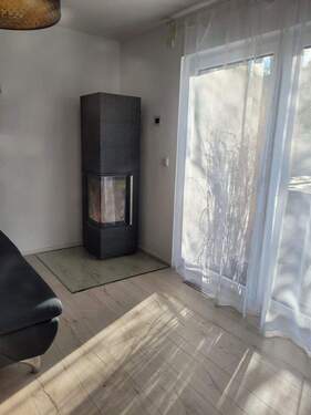 Wohnzimmer EG mit Kamin - 