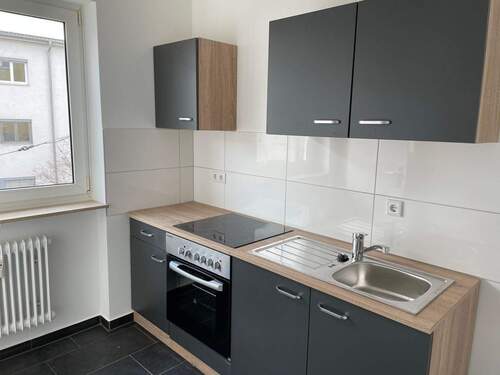 Küche - Renovierte 1-Zimmer-Wohnung mit Einbauküche in Nürnberg - Stadtteil Veilhof