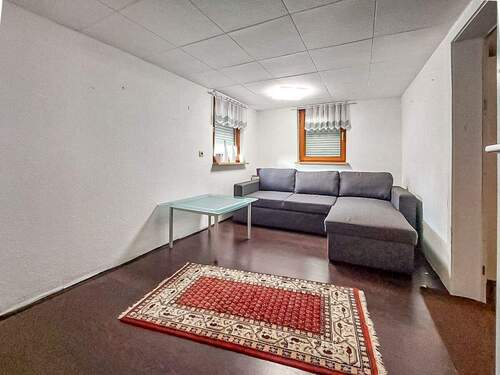 Wohnzimmer EG - 6 Zimmer Einfamilienhaus zum Kaufen in Friesenheim