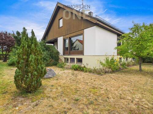 Bild 1 - Einfamilienhaus mit großem Garten in idyllischer Lage - renovierungsbedürftig, aber voller Potenzial
