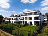 Haus D Süd-Ost Ansicht - 3 - Zimmer Erdgeschosswohnung mit großer Terrasse und Garten - Haus D, Wohnung 4.2