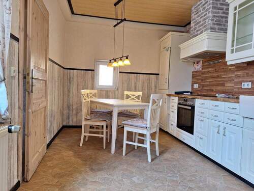 Küche mit Sitzmöglichkeiten - 