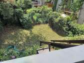Balkon und Treppe zum Garten - 
