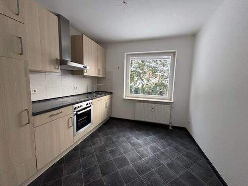 Küche mit Einbauküche - 