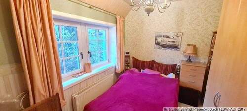 Schlafzimmer 1 im Erdgeschoss - 