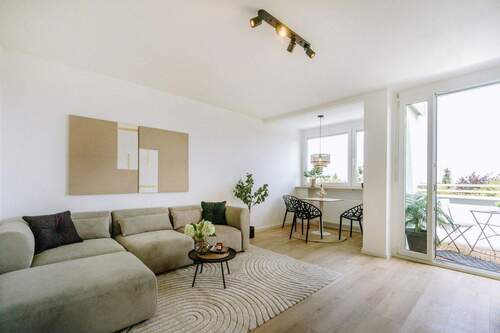 Wohnzimmer - Moderne 2-Zimmer-Wohnung, Erstbezug nach Sanierung, provisionsfrei