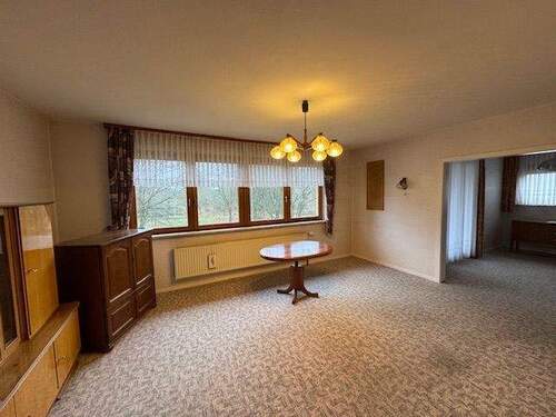 Wohnzimmer im EG - Einfamilienhaus mit 102,00 m&sup2; in Kusel zum Kaufen