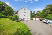 seitliche Ansicht mit Hof - Mehrfamilienhaus, Wohnhaus in Aachen zum Kaufen