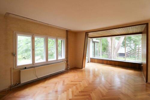 Wohnzimmer - 4 Zimmer Einfamilienhaus zum Kaufen in Berlin