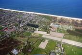 Luftbild - 3 Zimmer Etagenwohnung zum Kaufen in Wenningstedt-Braderup (Sylt)