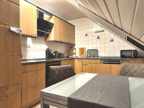 Zeitlos schöne Einbauküche in der Einliegerwohnung - 